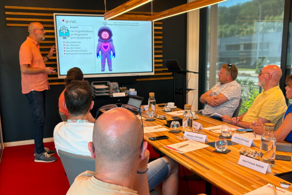 Atelier cybersécurité IA expliquant les protocoles humains de vigilance numérique